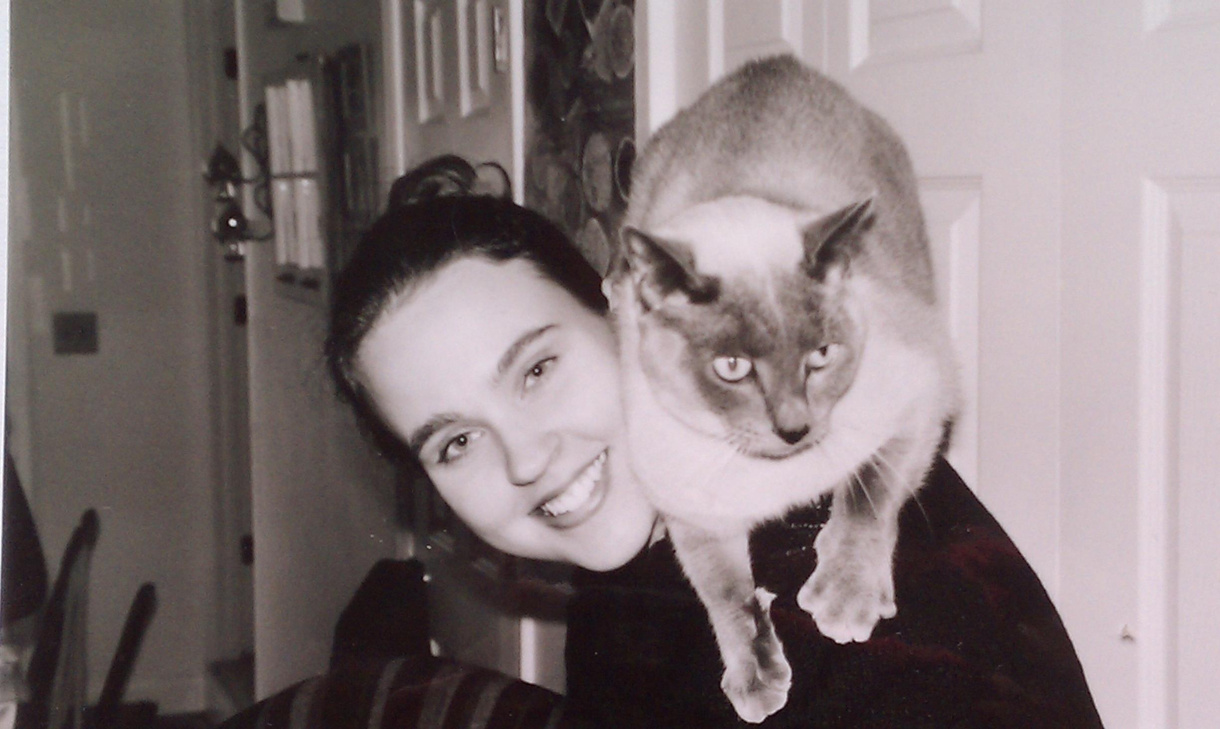 A fave candid of us. He loved to ride on our shoulders. 