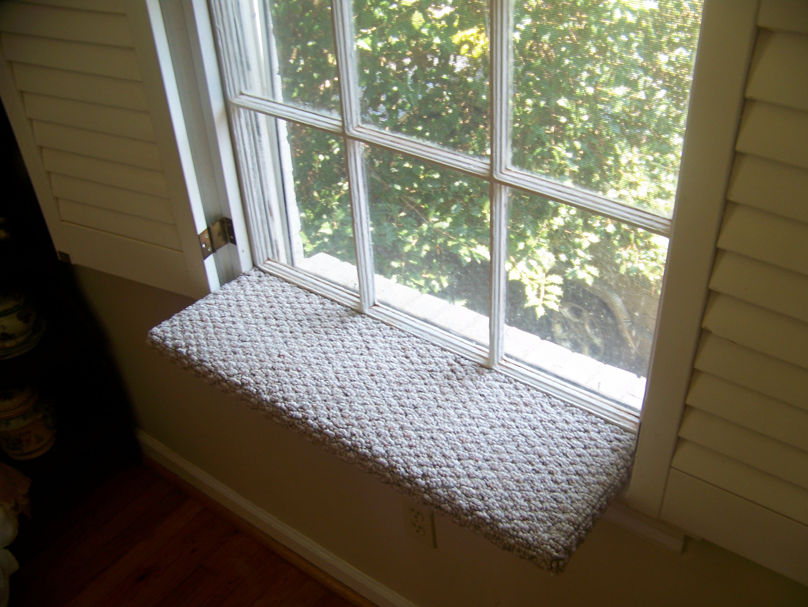 Window perches to maximize bird watching was also requested. Here, we utilized materials the client already had available around the home.