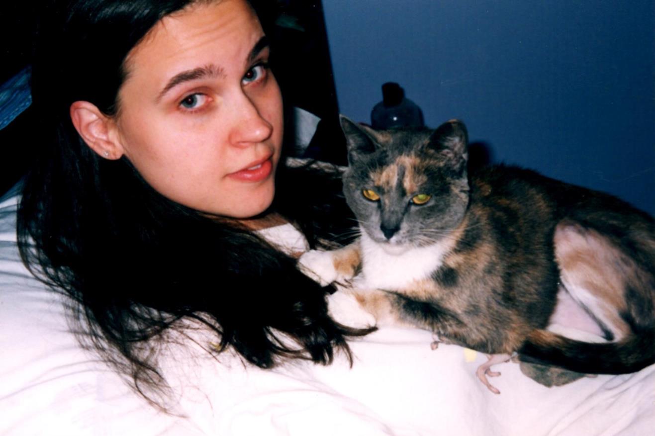 Cuddling (Copy) Cuddling together. She was a very sweet cat.
