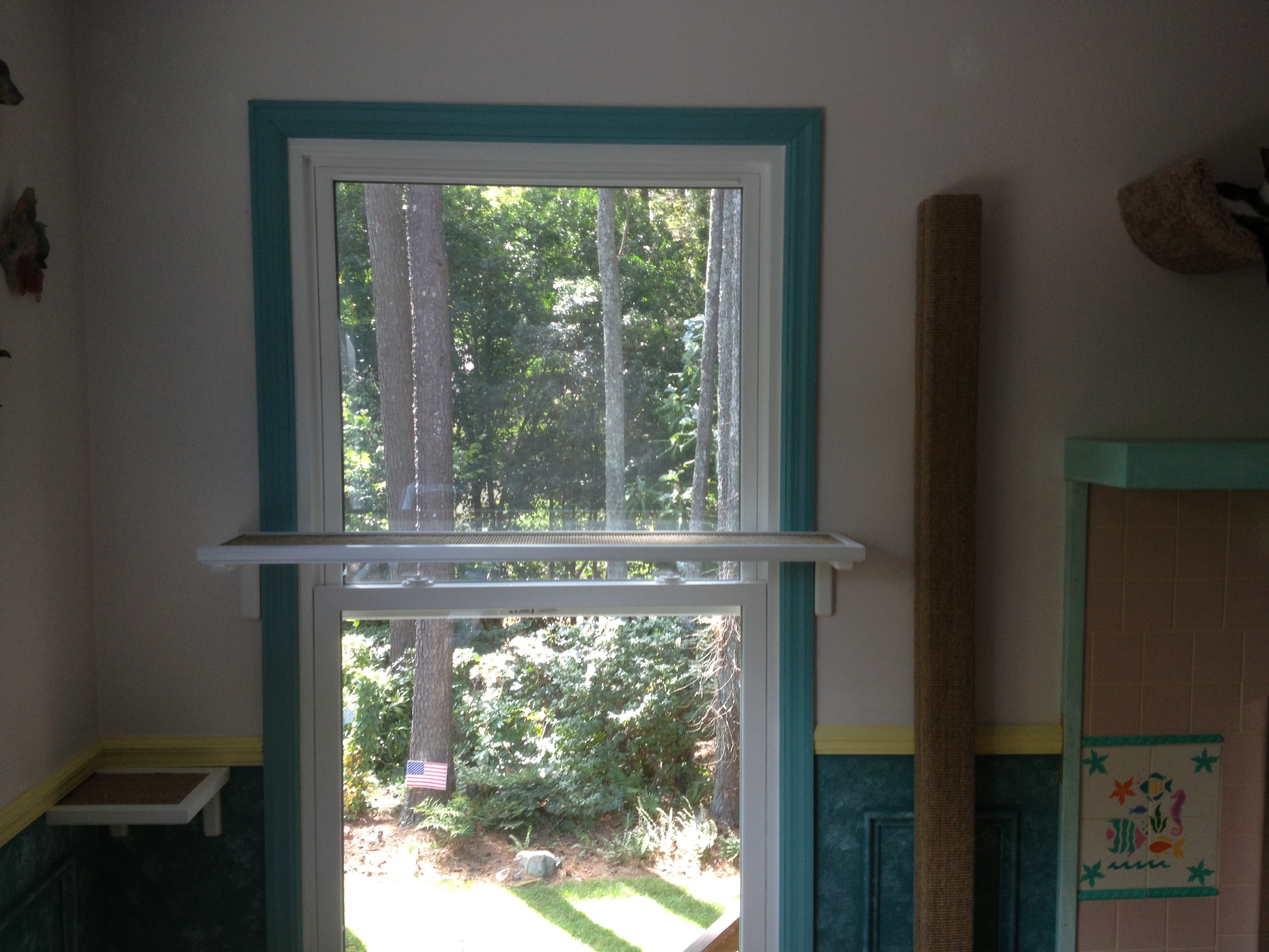 Notice step on far left, shelf across window leading to mantle. 