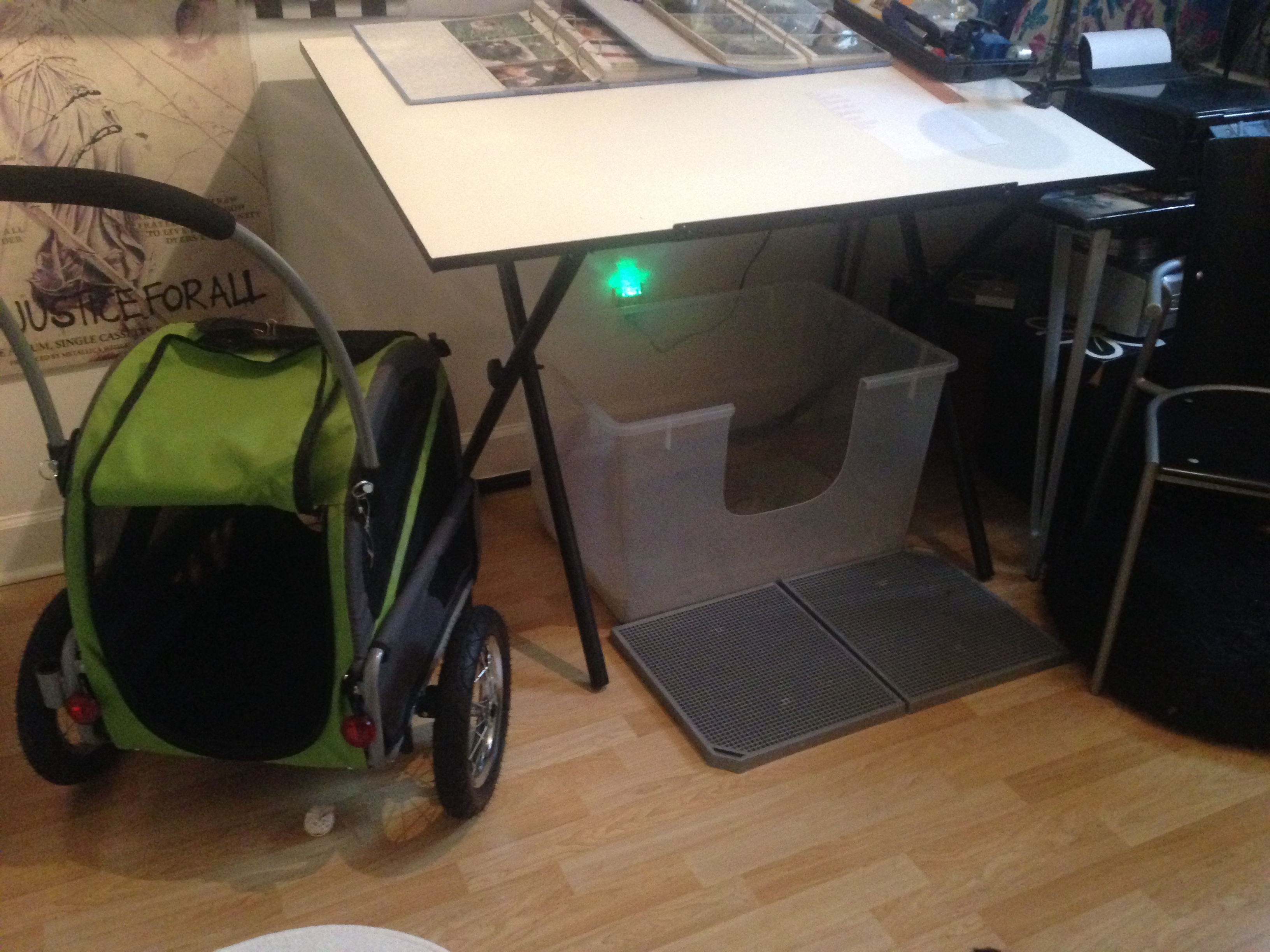 Under drafting table in studio. Under the drafting table in our "studio." (home office)
